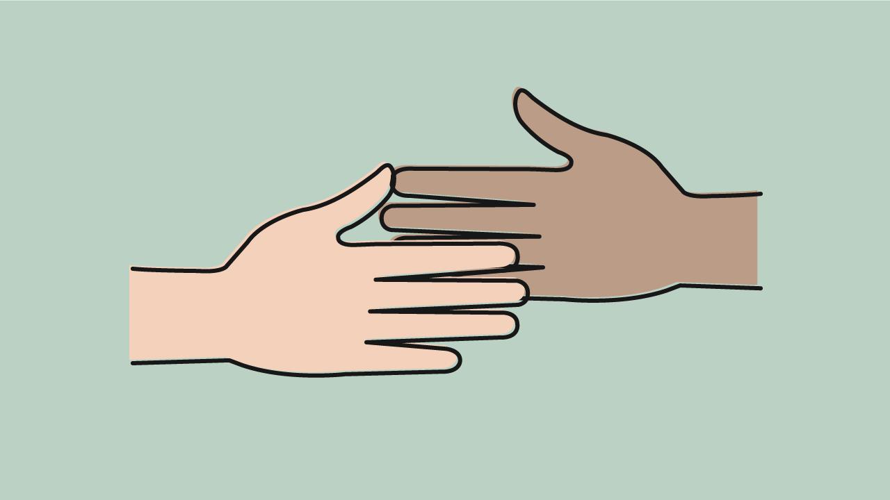 Ett par händer som sträcker sig mot varandra.