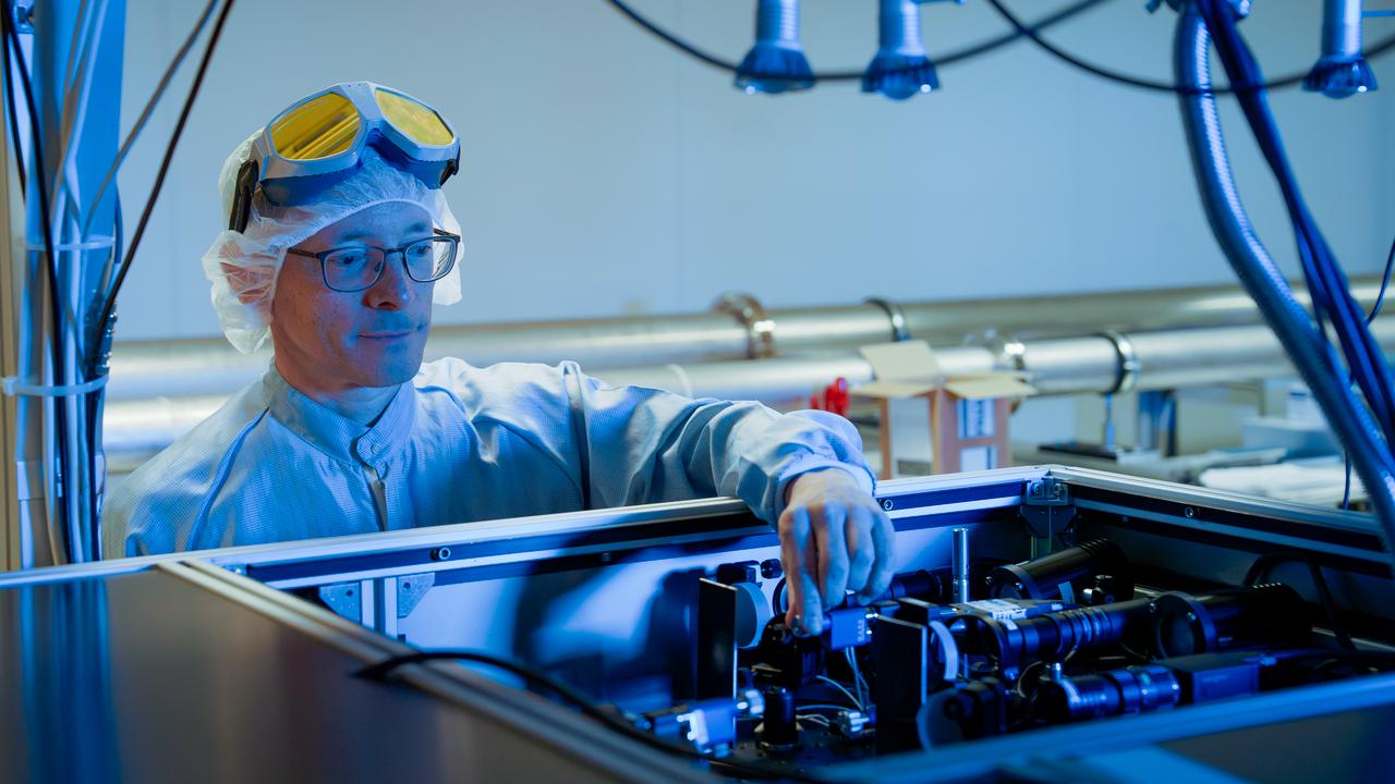 Laszlo Veisz aligning the Light Wave Synthesizer 100 (LWS100) laser at the Relativistic Attosecond Physics Laboratory (REAL), Department of Physics