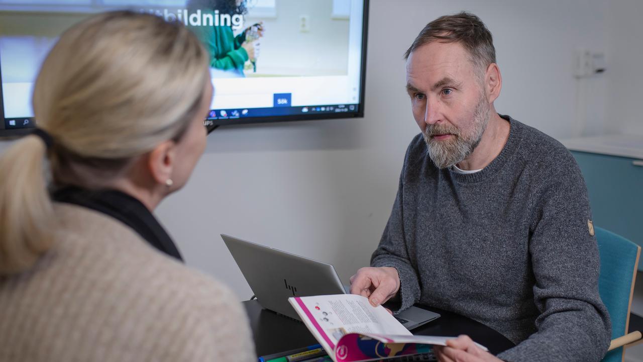 A man and a women talking