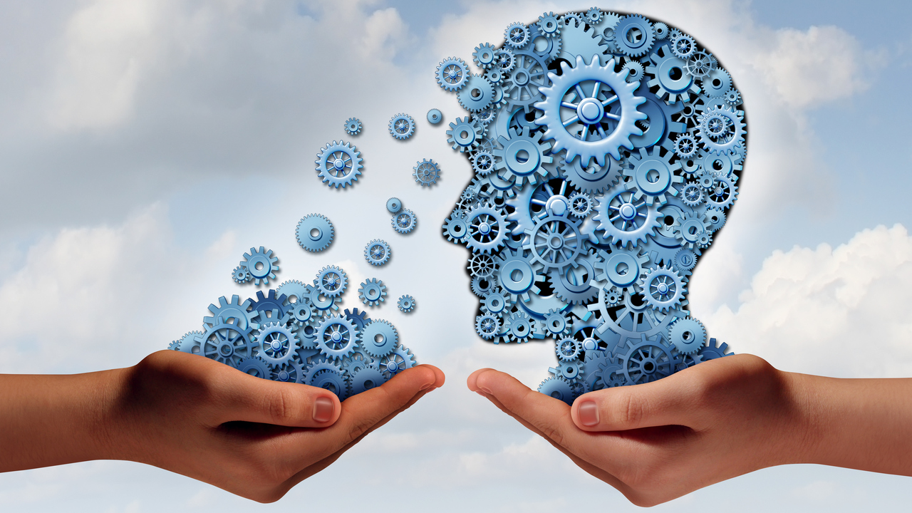 Illustration med händer som håller ett huvud fullt med kugghjul.