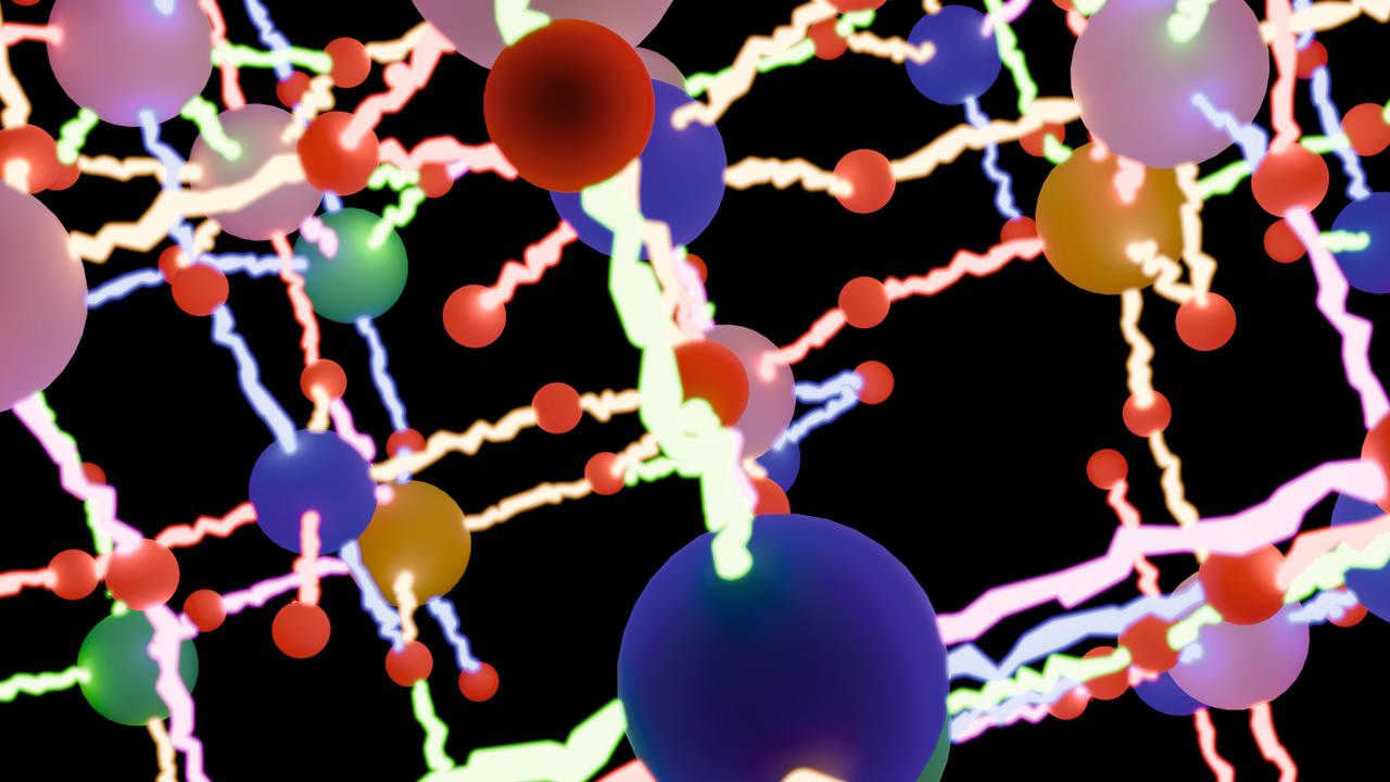 Ett gäng färgglada bollar på en svart bakgrund.