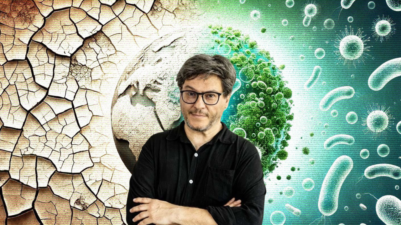 Ricard Solé in front of an earth drying and microbes