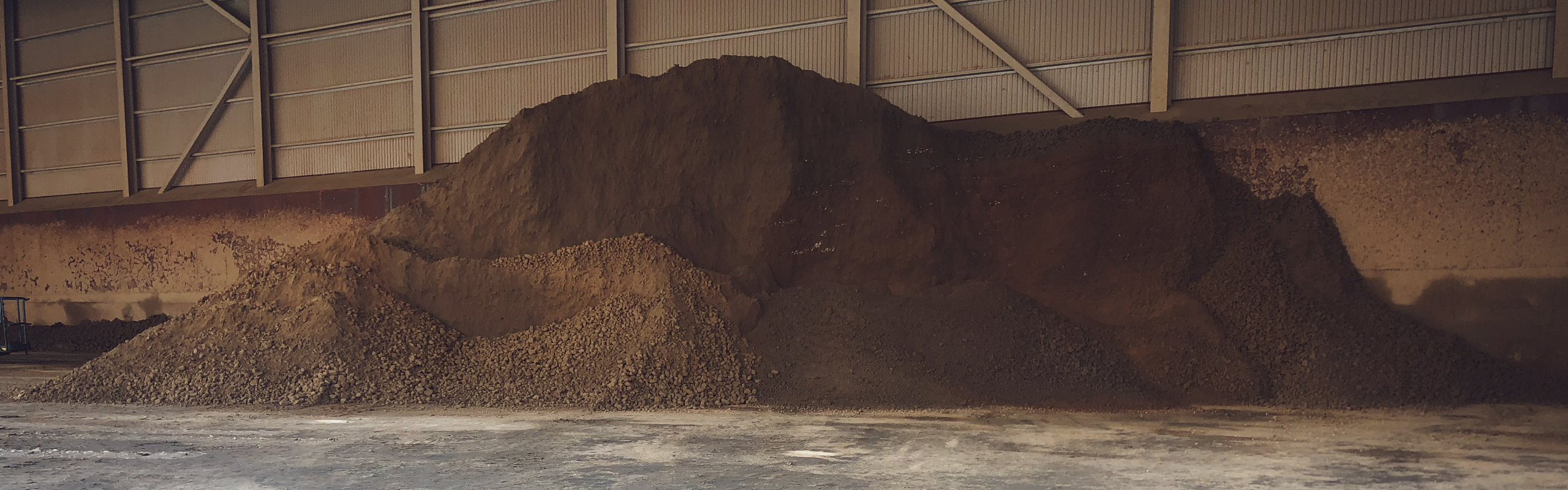 The toxic remains of consumption and production: a heap of flyash, from waste incineration, mixed with sulphuric acid, used in mining. NOAH Langøya, Holmestrand, Norway.