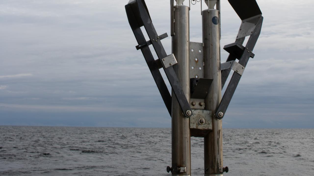 sediment corer on its way into the water.