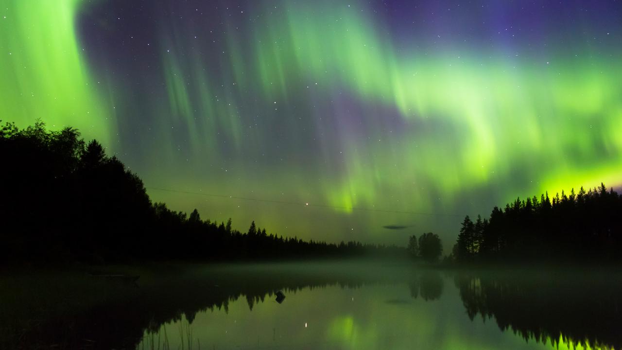 Northern lights over the Umeå river.