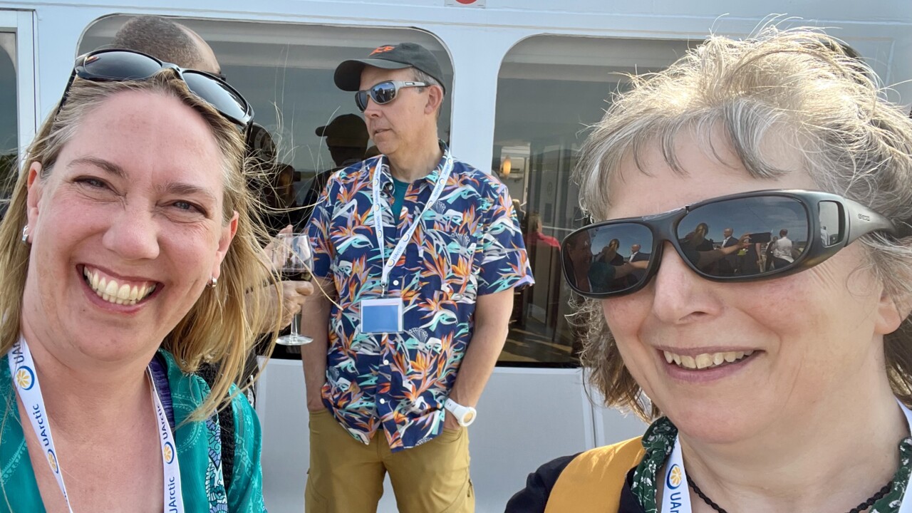 Picture of Anngelica Kristoferqvist and Lena Maria Nilsson, with Keith Larson in the background