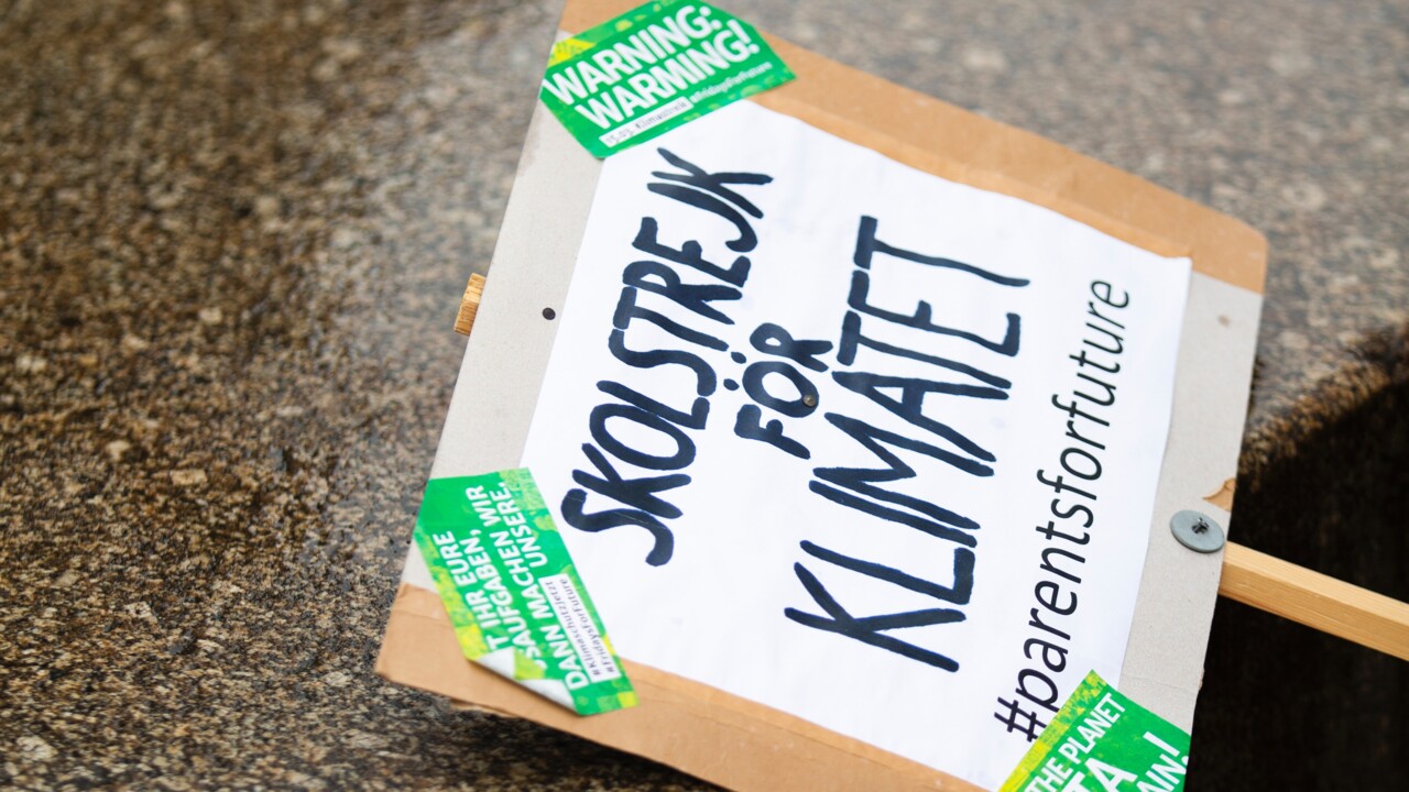 Protest sign lying on the street