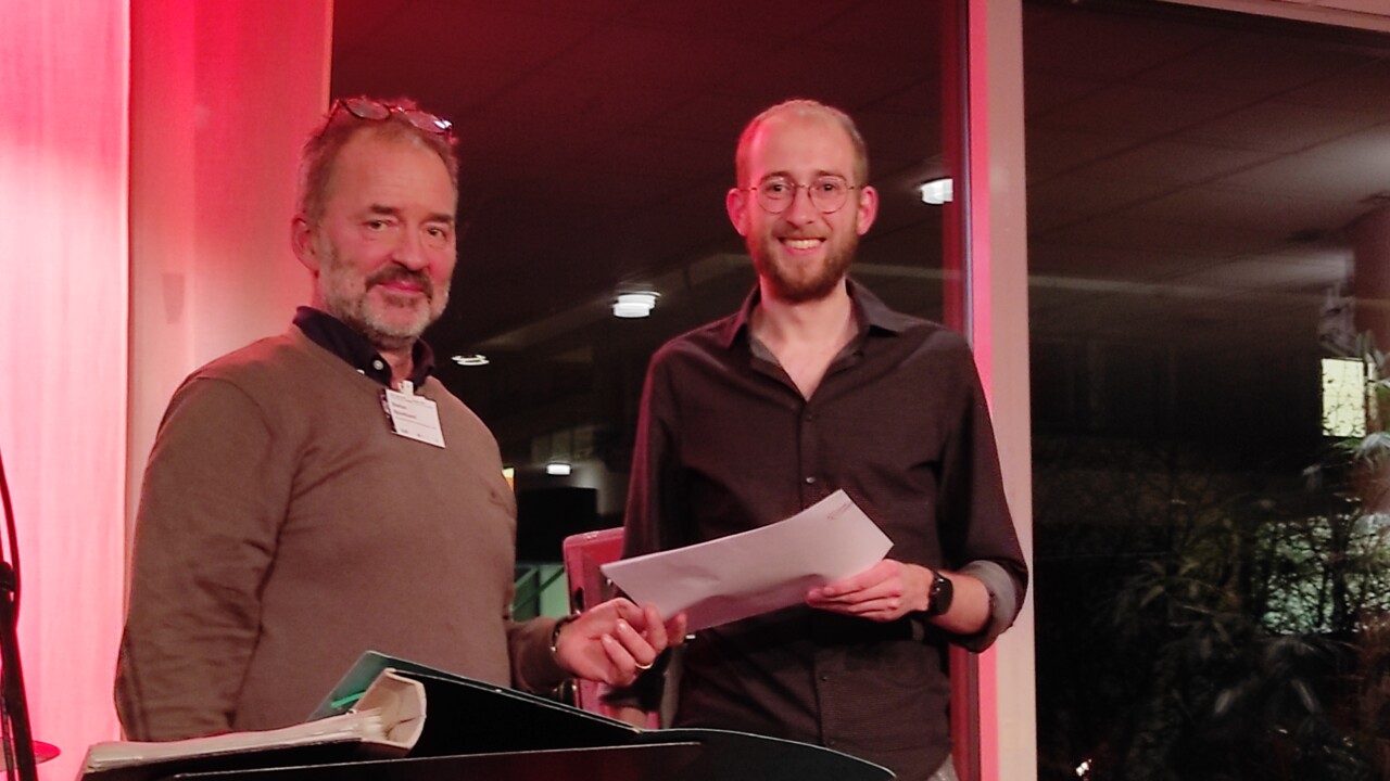 Karsten Meier, department of Molecular Biology, is receiving the