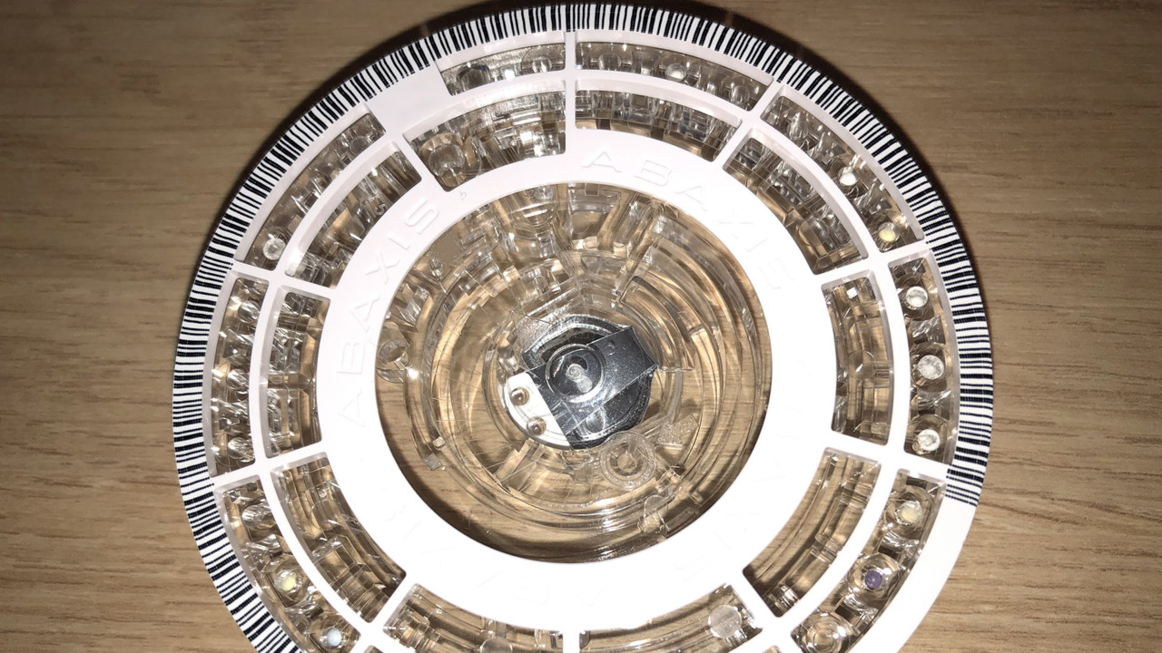 Photo show a rotor for analysis of several blood chemistry parameters