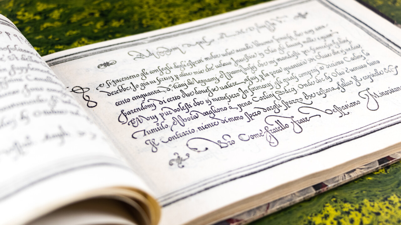 Uppslag av bok från Ekströmsamlingen