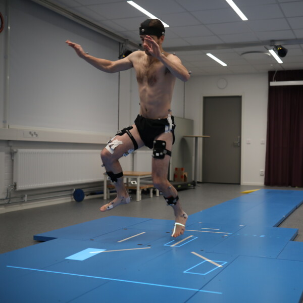 Person with electric measurement equipment jumping