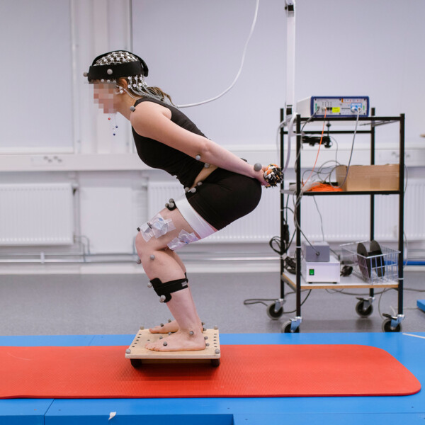 Person with electro measureing equipment