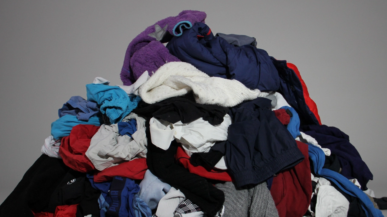 Textile Waste =clothes that are worn out, dirty, pilled, have a bad smell, or are made of sensitive materials such as underwear, swimwear and similar items.