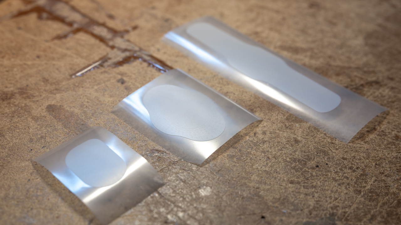 Adhesive foil prototypes, processed on a vinyl cutting machine, were used for concept validation and ergonomic shape assessment.