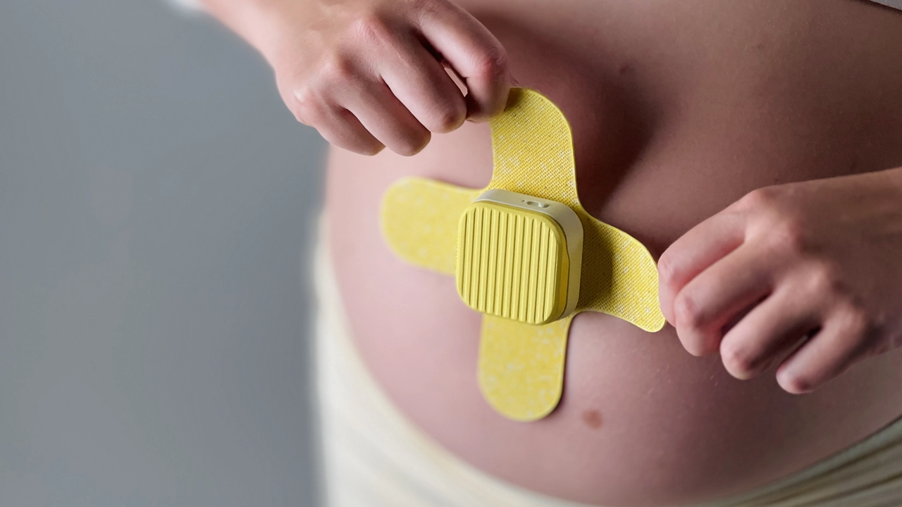 Placing the product on the pregnant belly.