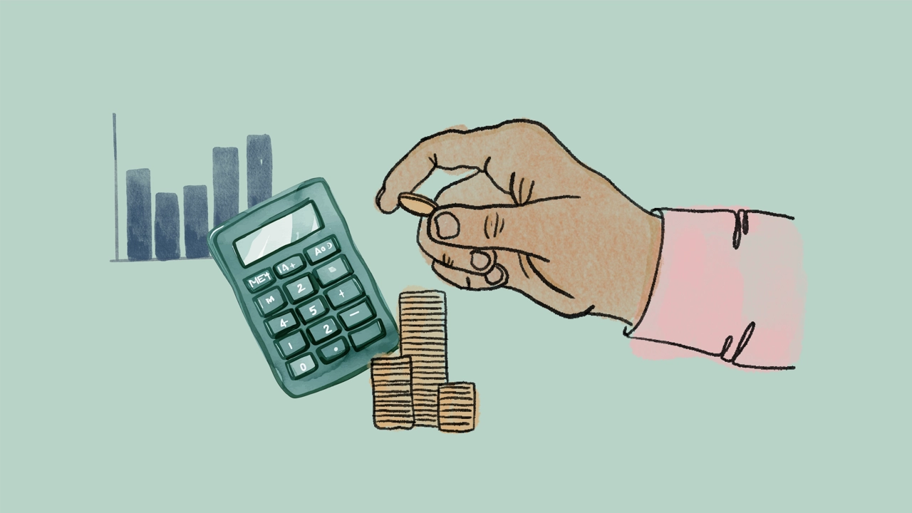 A calculator and a hand piling coins into stacks. A graph in the background. 
