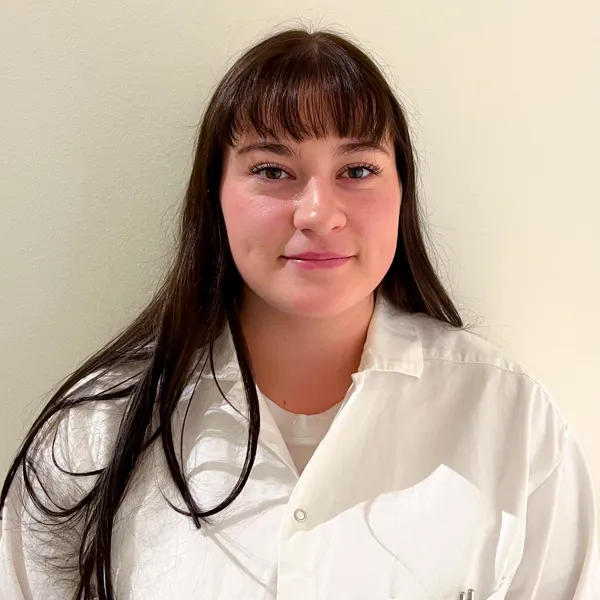 Bild på Eleonora Hedin i vit labbrock