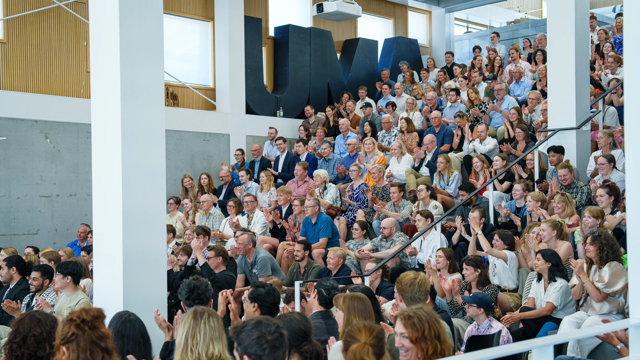 Theatre space inside Umeå School of Architecture full of people during End of Year ceremony