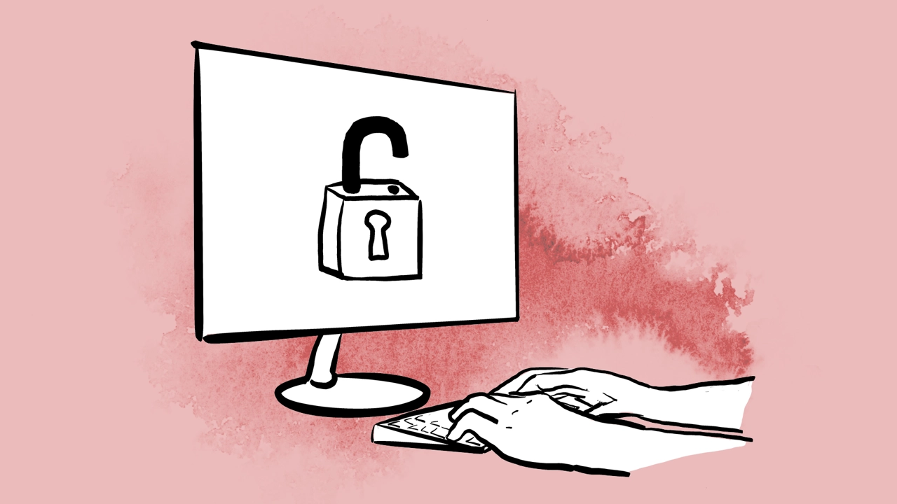 Two hands typing at a keyboard with an open padlock on a screen in front.