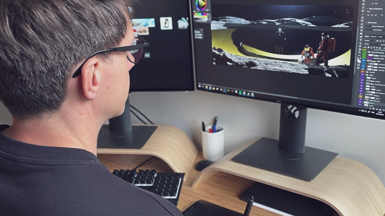 Photo of Englander during his 3D animation design process sitting in front of the computer