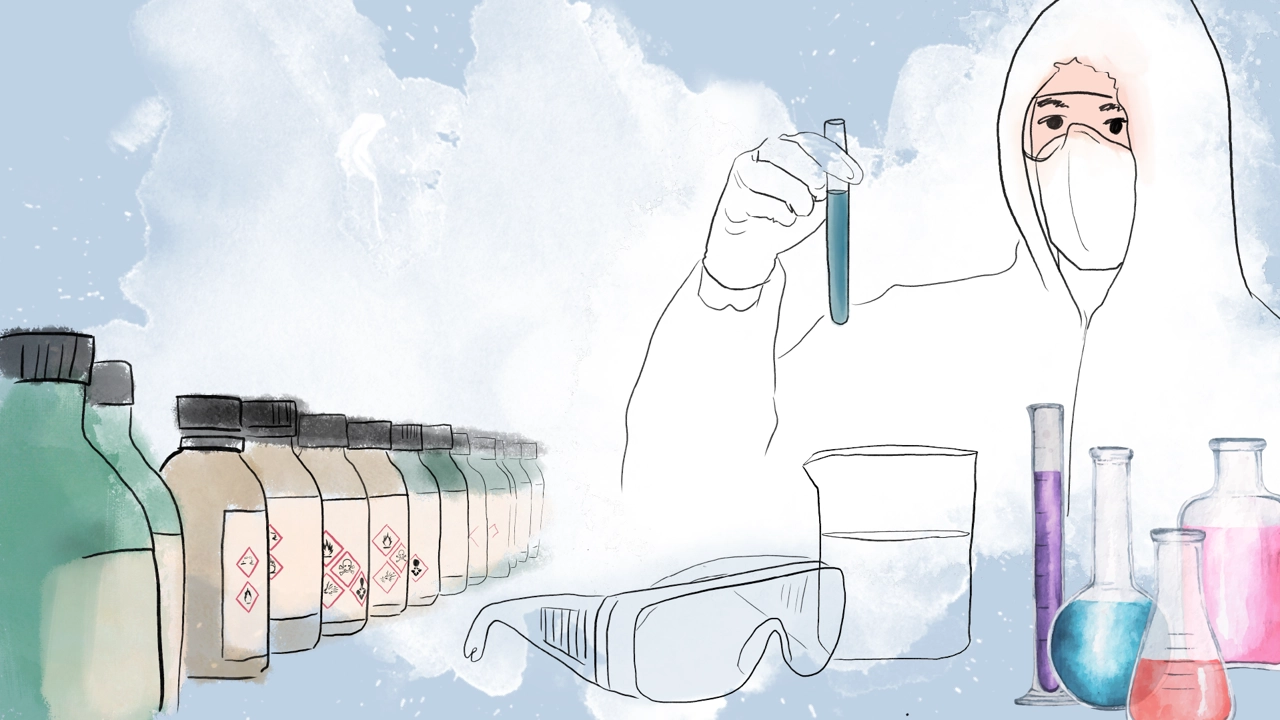 Person with protective lab clothing holding a test tube with bottles in the foreground.