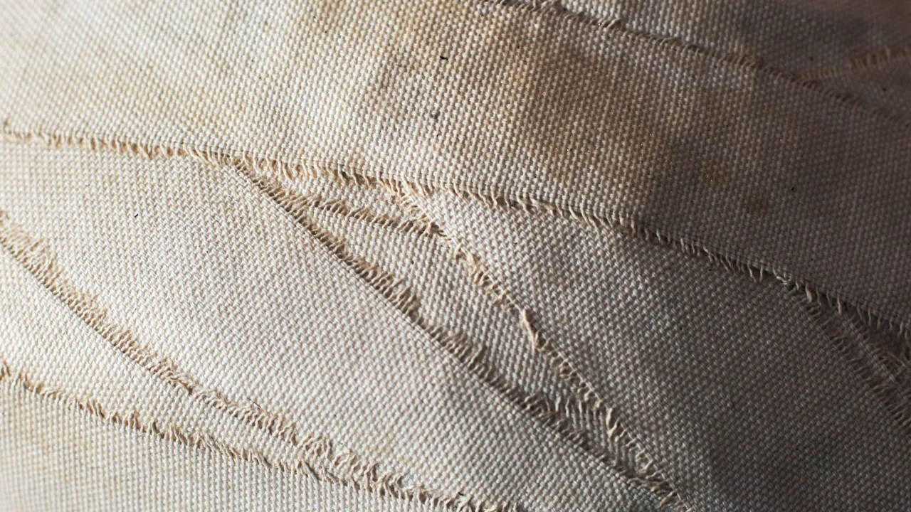 Detalj av textilt verk