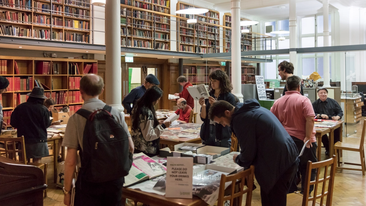 Within the frame of its Special Collections and Archives, the Bishopsgate Institute hosts workshops focusing on different topics in which participants are allowed to explore the collections and arrange material in ways that enable their own sense-making and interpretation of the topic. The photo shows the Art Night Zine Making Workshop at Bishopsgate Institute’s Special Collections and Archives. Photo: Dan Weill.