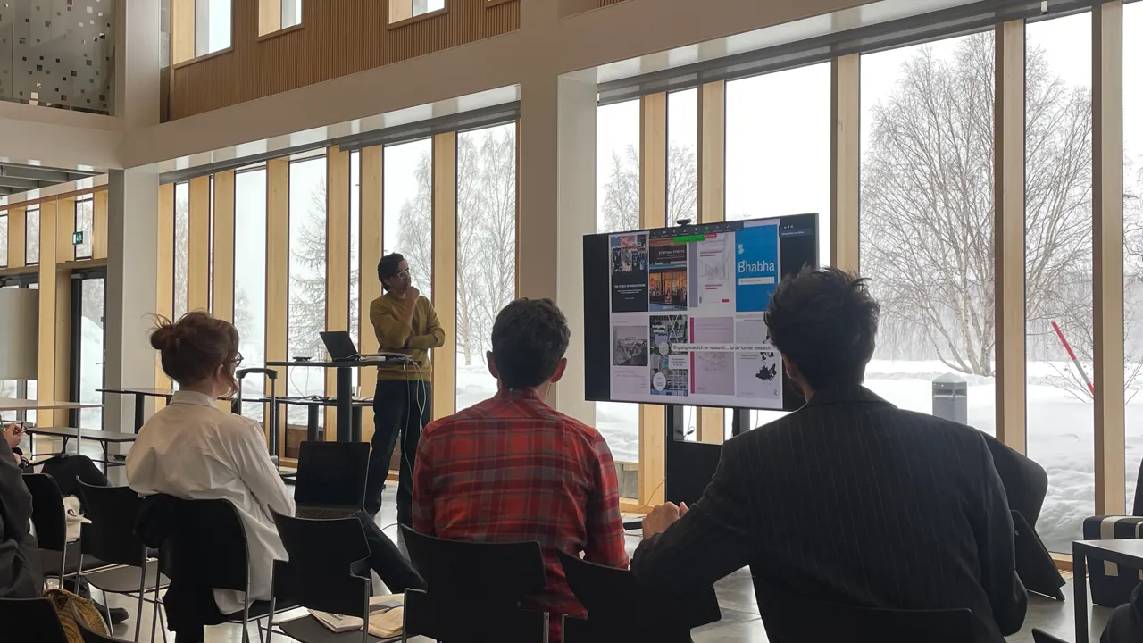 Presentation with screen in Architecture School, snow outside