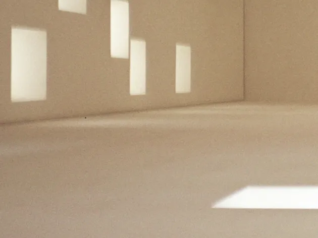 Abstract image of empty room with windows and light reflections