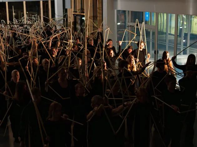 students performing in a dark environment