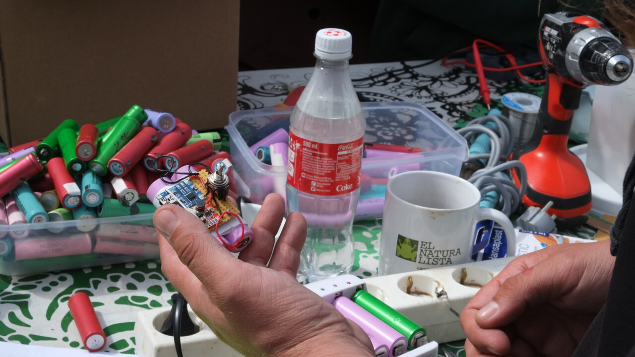 Community powerbank workshop, Open Source Circular Economy Days Helsinki, June 2016. Sustainability oriented activist groups often host workshops to encourage learning about issues hands-on. Here they are taking lithium batteries from discarded laptops and teaching people how to wire them together to create USB chargers.