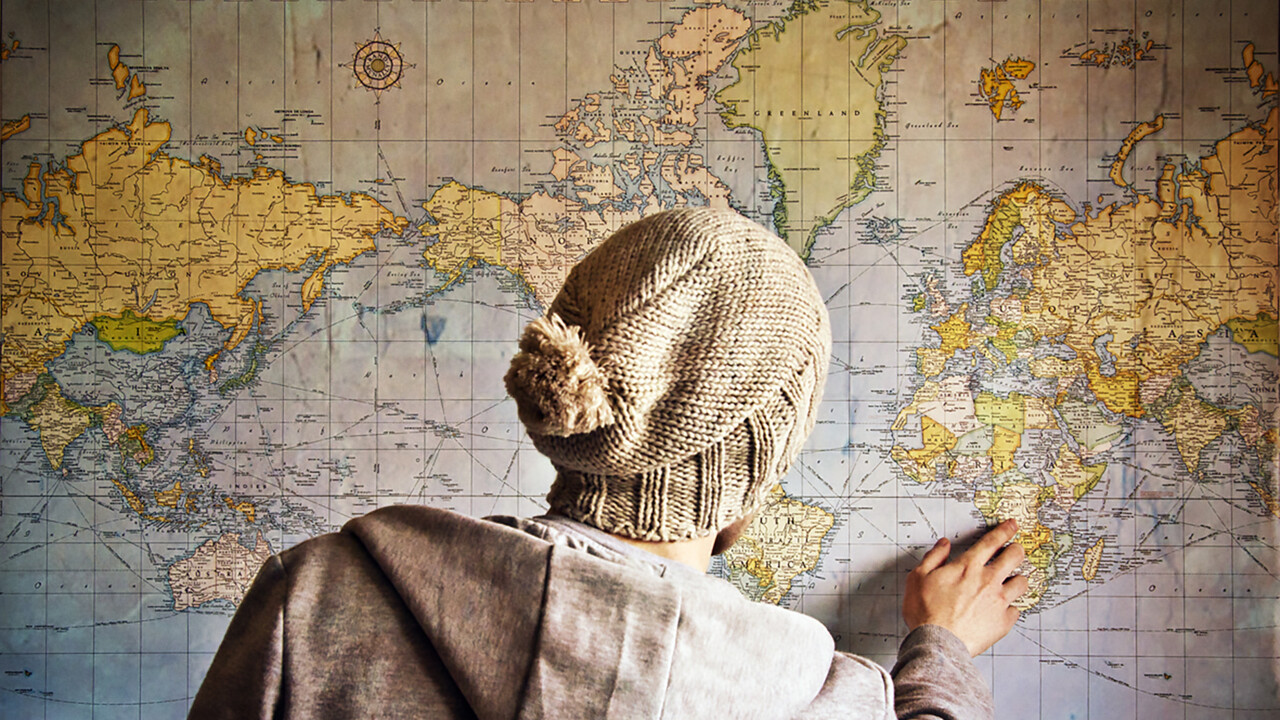 Bild på kille framför världskarta